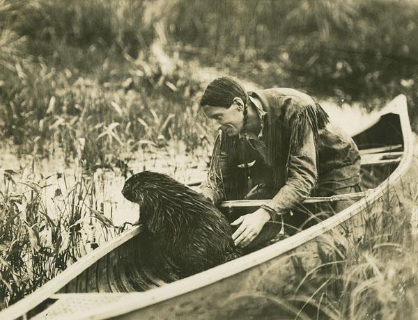 Beaver in a canoe with Grey Owl, 