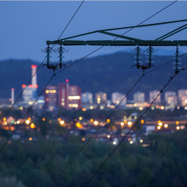 City at night with transmission lines