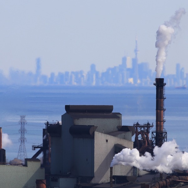Hamilton, Ontario industrial area with Toronto skyline in the background