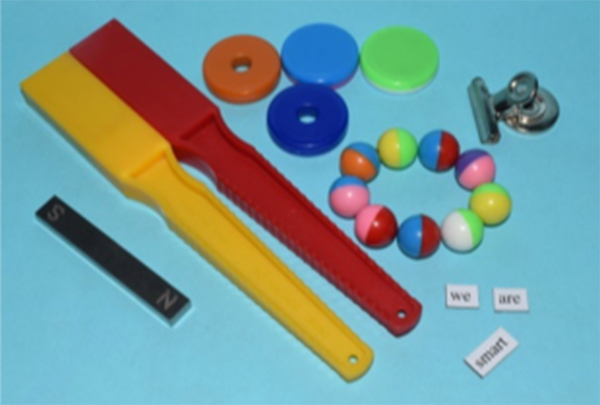 Assortment of magnets including bar magnets, ring magnets and ball magnets 