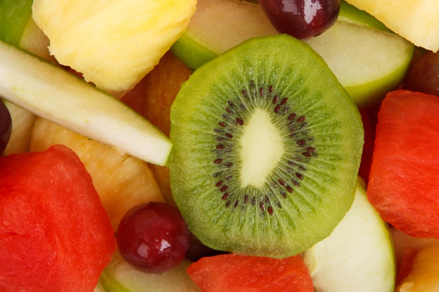 Pieces of cut fruit, including a kiwi 