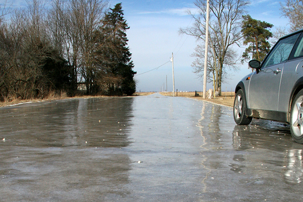 An ice-covered gravel road