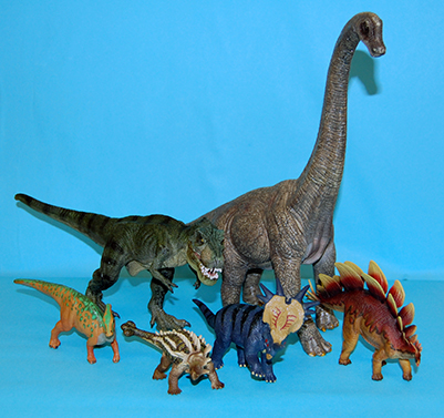 Assortment of toy dinosaurs