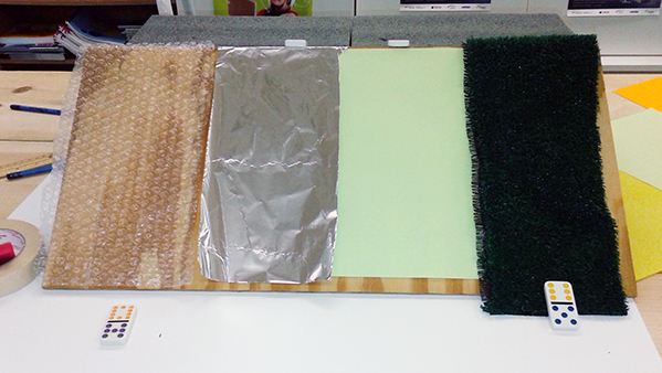 Fair test set-up to compare bubble wrap, foil, paper and artificial turf 