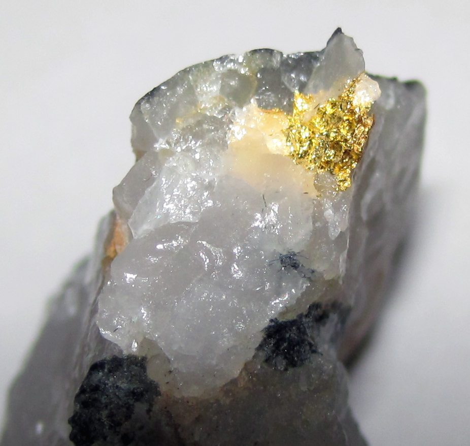 Gold in a piece of quartz from Manitoba