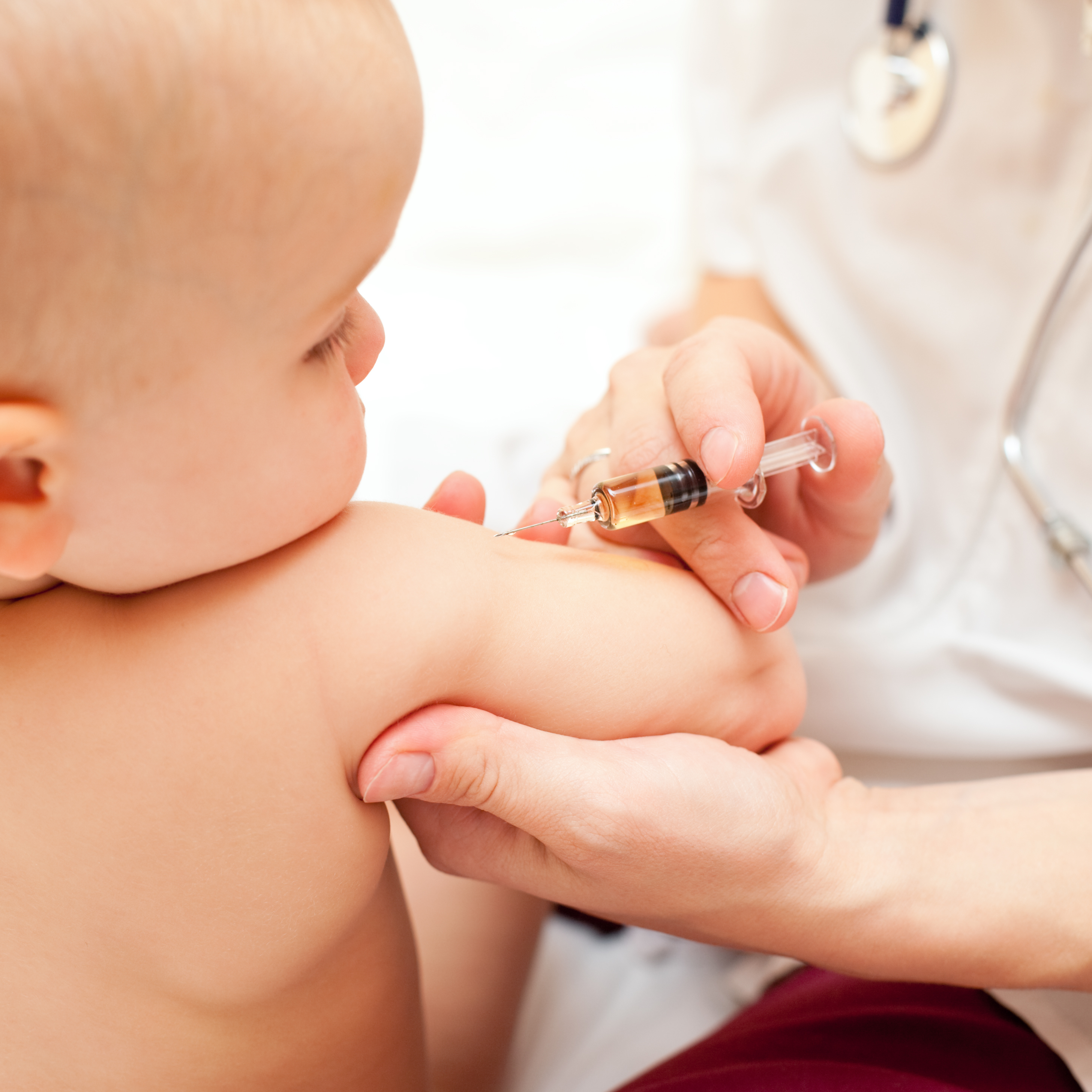 Infant receiving a vaccination