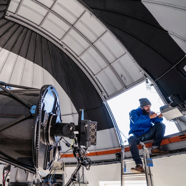 Astronomer technician in observatory