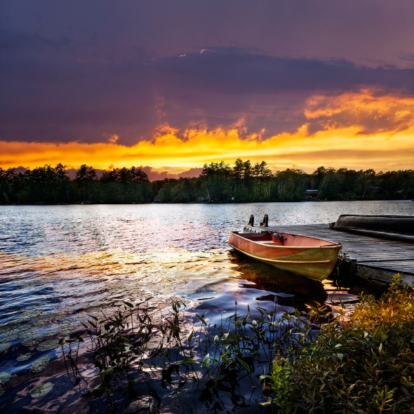 Boat on a lake at sunset