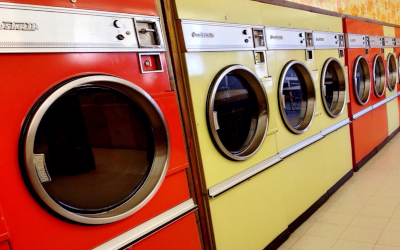 Retro dryers lined up at a laundromat 