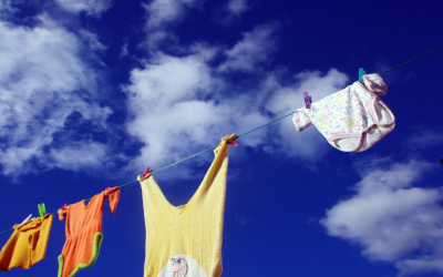 Clothes hanging out to dry with a background of deep blue sky 