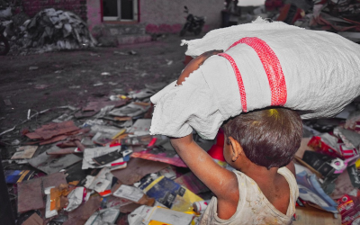 Small child dwelling among trash