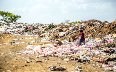 Trash heap in Nicaragua with a child 