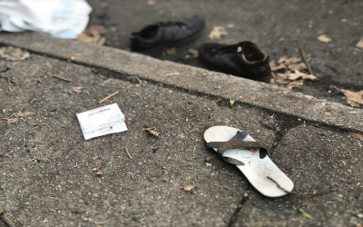 Abandoned shoes on a Brooklyn street corner