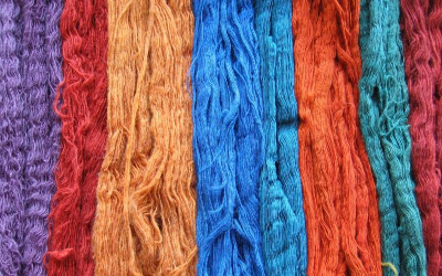 Natural wool skeins dyed in multiple colours