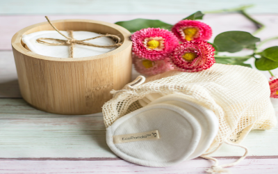 Eco-friendly cotton makeup pads displayed with other items