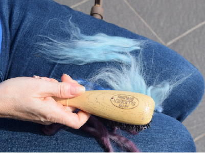 lay fibres down as you brush them out
