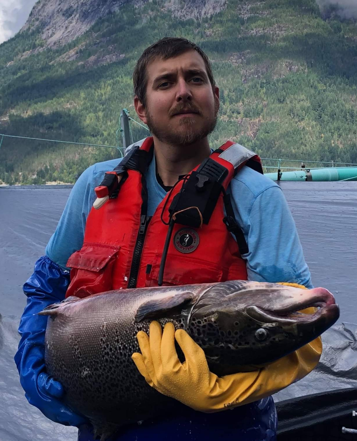 Jordan Frizzley holding a huge salmon