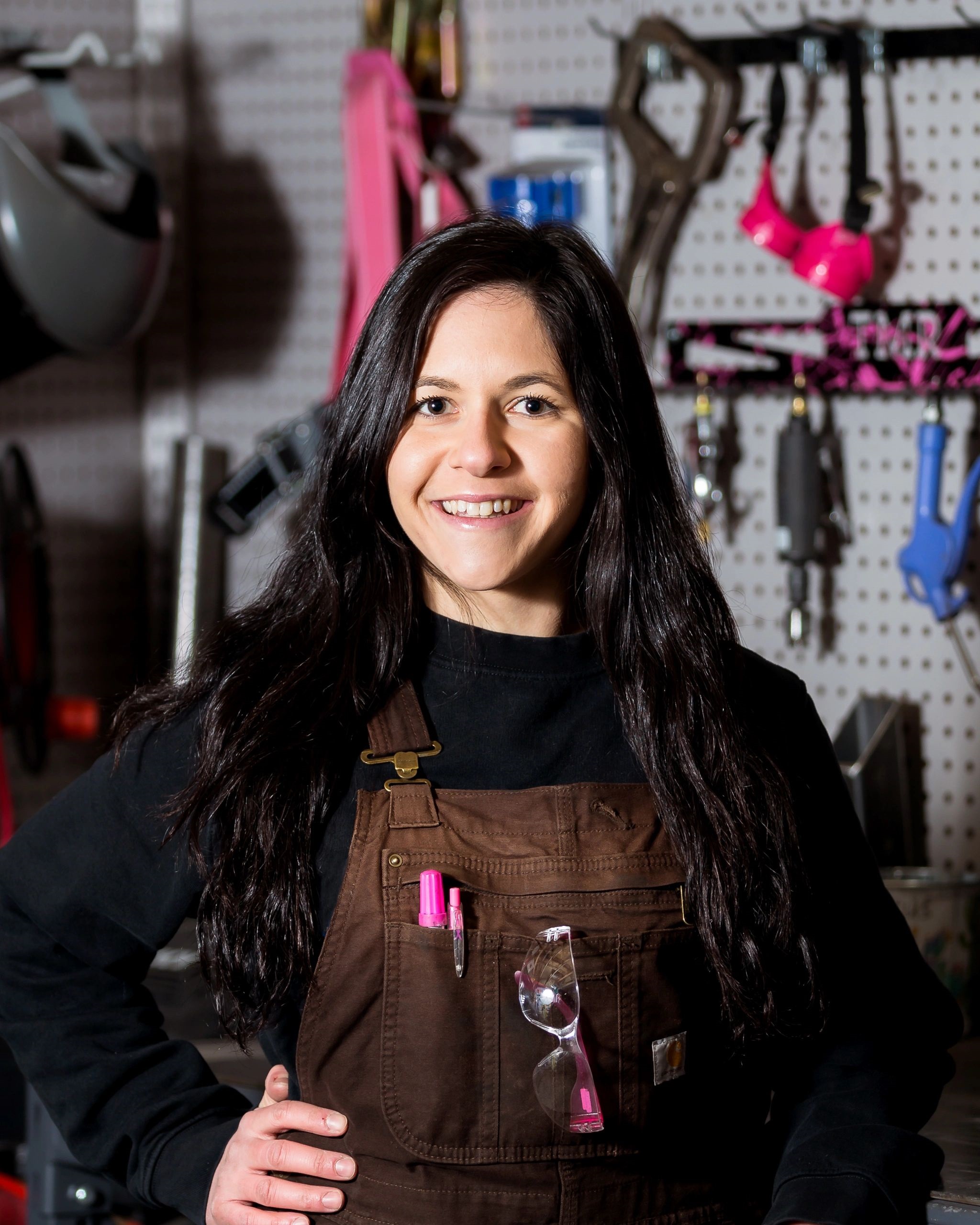 Daniela Torelli in welding shop.