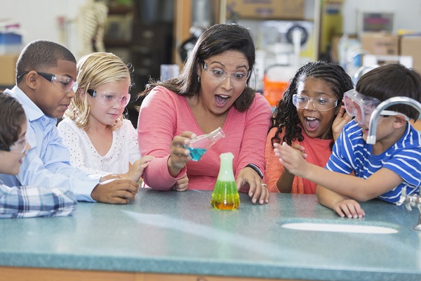 Science teacher with students