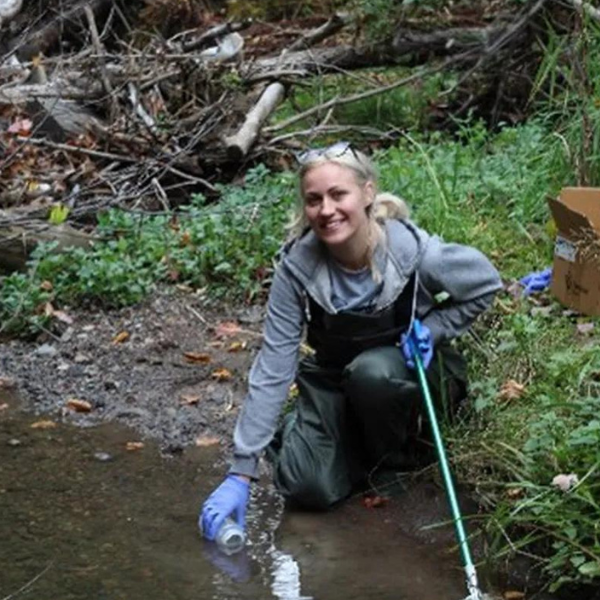 Shelby Wright, MSc student, University of Windsor, sampling water for eDNA