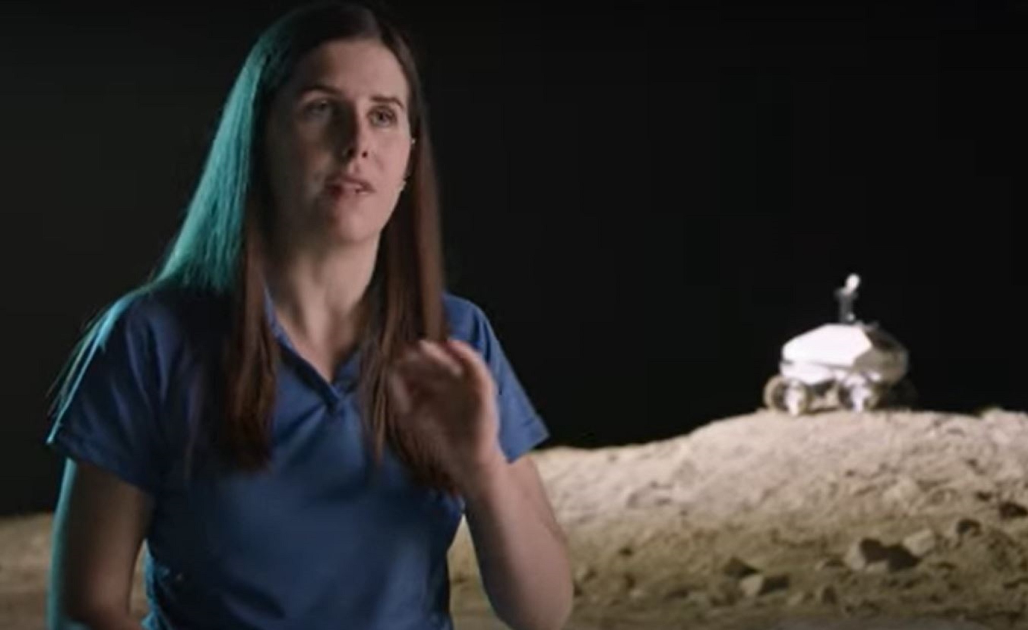 Evaline Warmels with lunar rover in background.