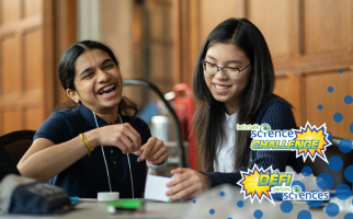 Two girls laughing at the Let's Talk Science Challenge