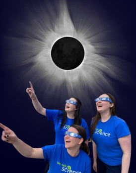 Volunteers looking at eclipse