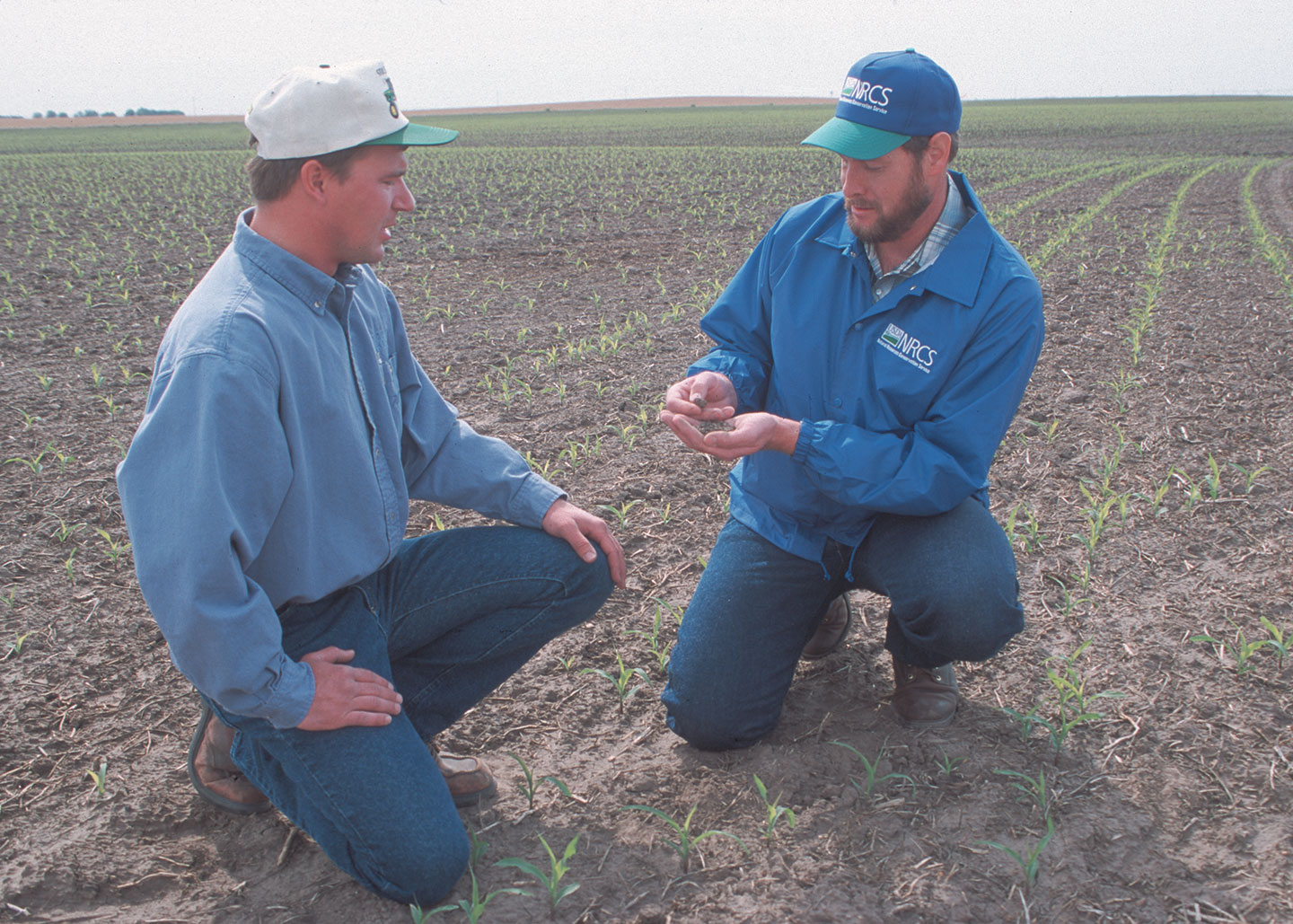 Discussing Soil Nutrients With Farmer