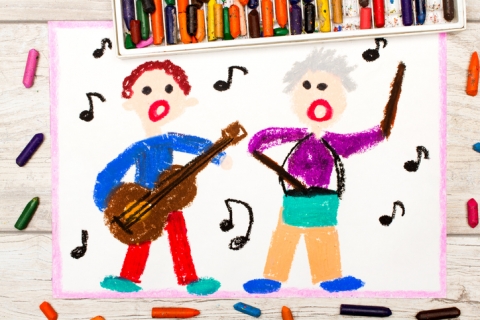Children’s drawing of people singing and playing musical instruments 