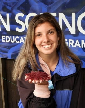 Cassidy Arnold holds a red starfish