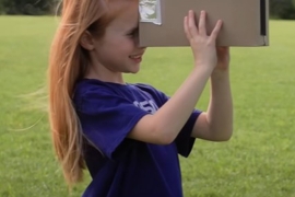 Child using box eclipse viewer