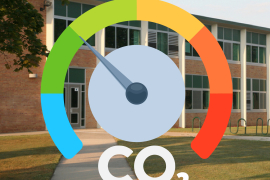 CO2 symbol in front of a school
