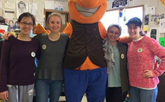 Alexa, Dhekra, Sam and Candice standing with the Health and Diabetes Program mascot