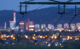 City at night with transmission lines