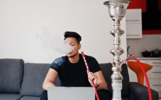 young man smoking hookah