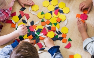 Children exploring pattern blocks