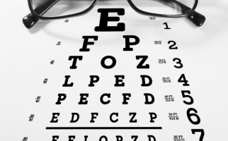 Eyeglasses and a visual test chart