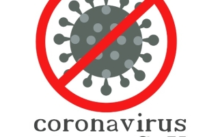 Cartoon coronavirus overlayed with a “no” symbol 