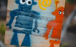 Wooden cardboard with robots painted
