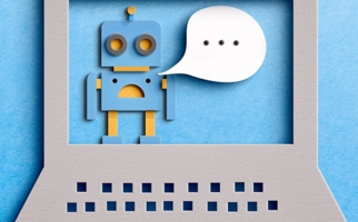 Paper cutout of chatbot on computer screen