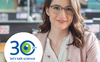 Melissa Valdez smiling at camera in a science lab with the Let's Talk Science 30th Logo