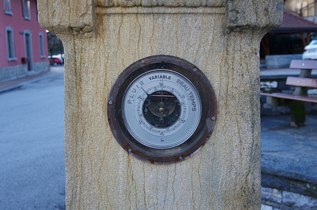 Barometer embedded into a post