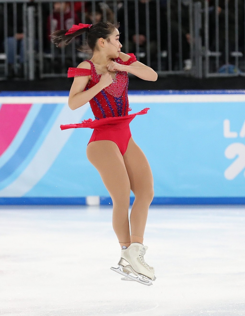 Figure skating spinning in the air at the 2020 Winter Youth Olympics