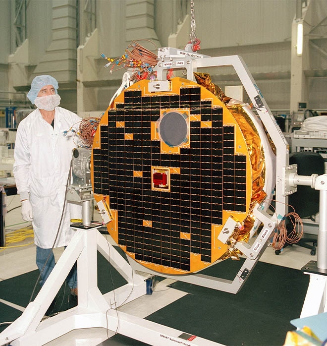 The Canadian SCISAT spacecraft during testing at the Canadian Space Agency David Florida Laboratory (DFL) in Kanata, Ontario in November 2002