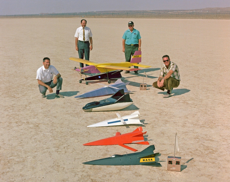 Engineers from the NASA Langley Flight Research Center pose with their radio-controlled scale flight test model fleet, 1969 