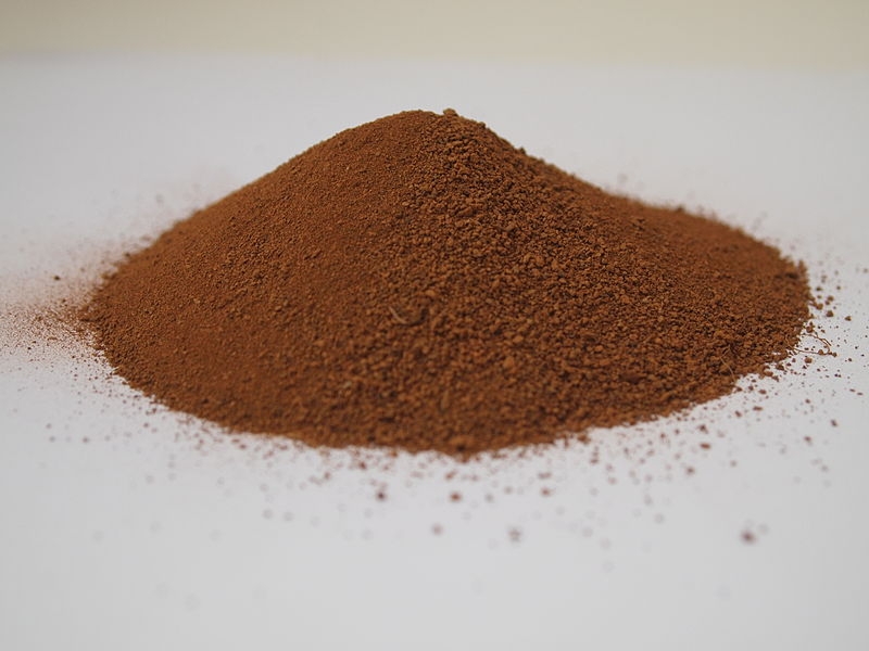 Colour photo of reddish granules of Martian regolith