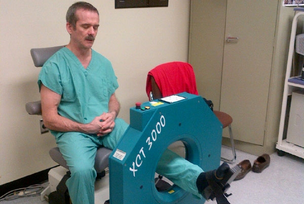 Chris Hadfield undergoes a quantitative CT scan to obtain detailed images of the bones in his ankle, shortly after his return to Earth in 2013