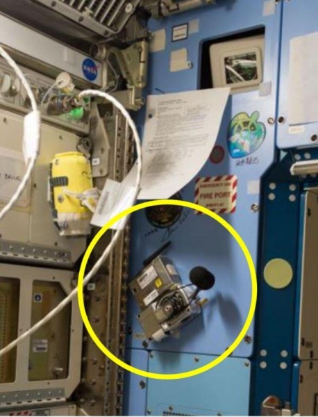 A noise dosimeter installed on a wall of the International Space Station 
