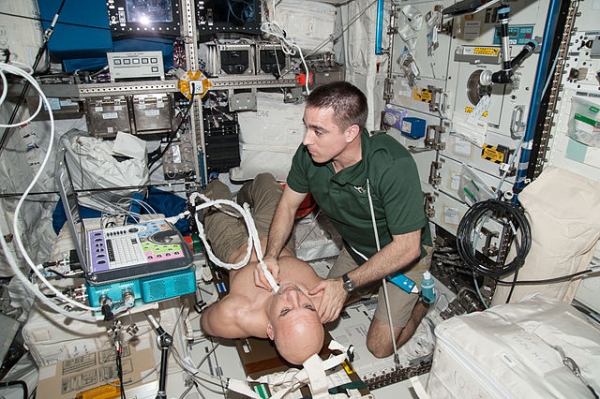 NASA astronaut Chris Cassidy performs an ultrasound\