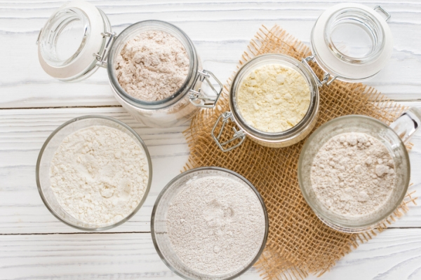 Jars filled with a variety of types of flours